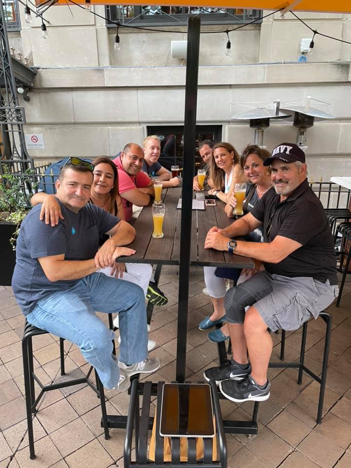 a group of people sitting in a chair