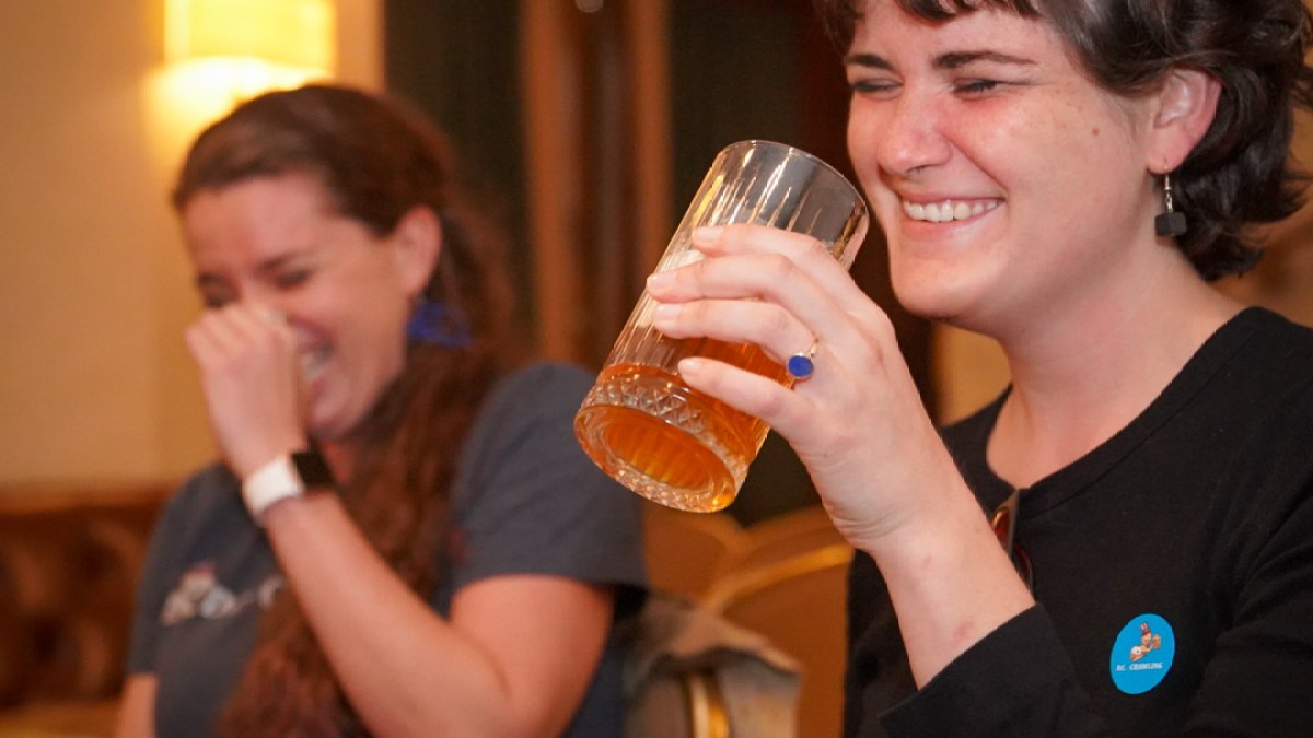 a person holding a glass of wine