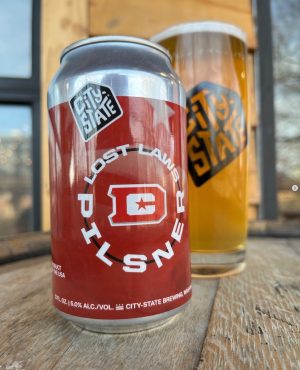 a can of soda on a table