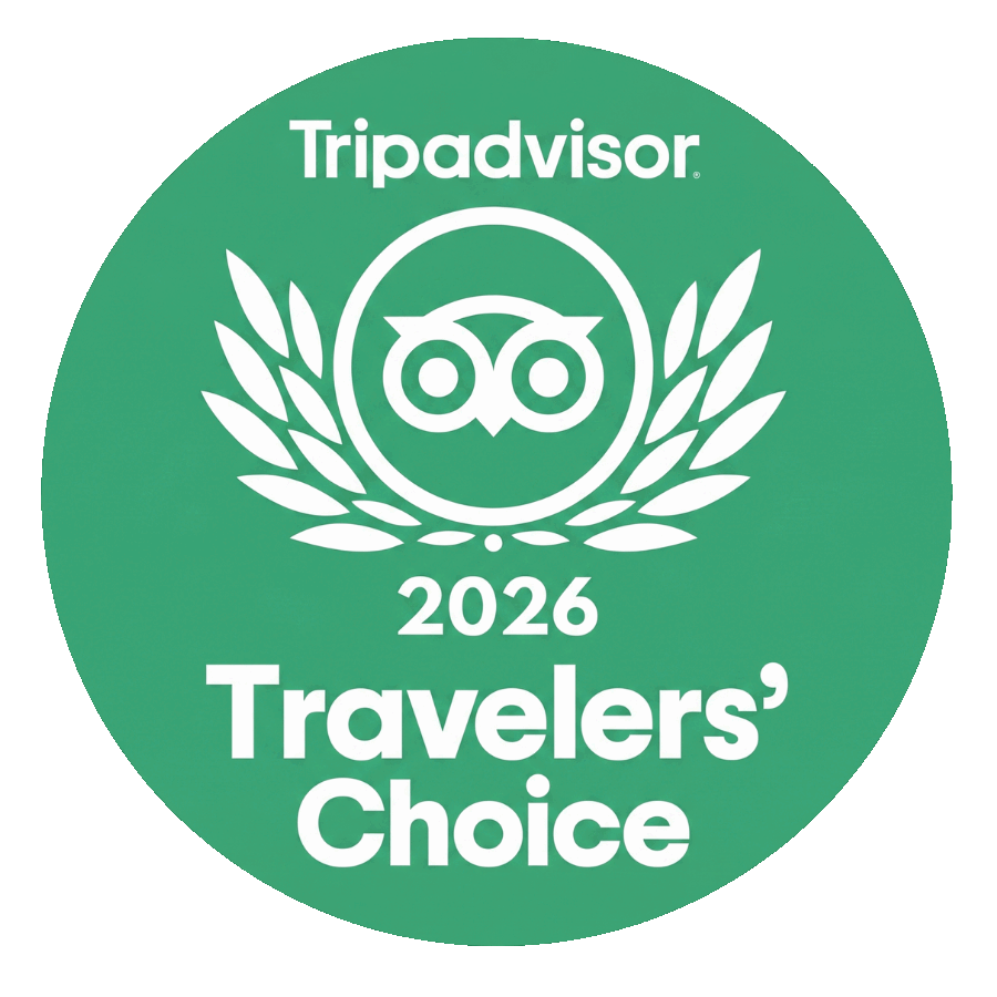 Tripadvisor 2026 Travelers' Choice green badge with owl logo and laurel wreath.